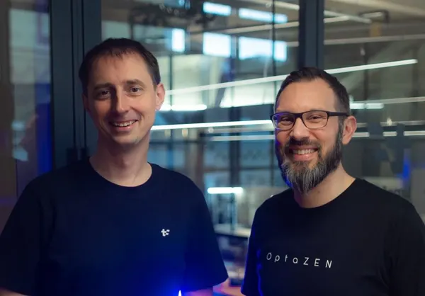 Geoffrey De Smet in a Timefold shirt and Simon Tiffert in an OptaZEN shirt at the Timefold office